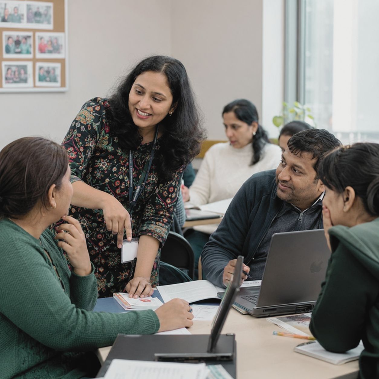 Facilitator guiding a learning group